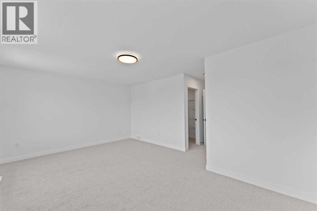 Photo 19 of 129 Heritage Boulevard, Cochrane AB