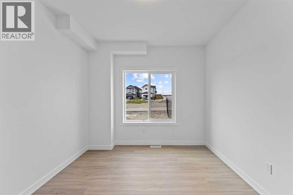 Photo 16 of 129 Heritage Boulevard, Cochrane AB