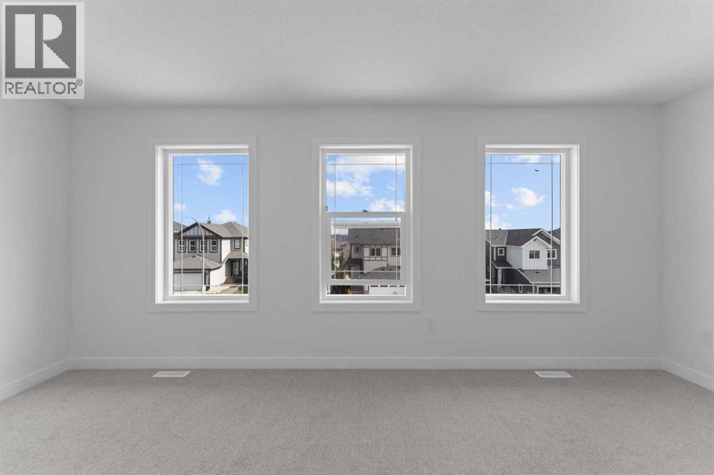 Photo 26 of 129 Heritage Boulevard, Cochrane AB