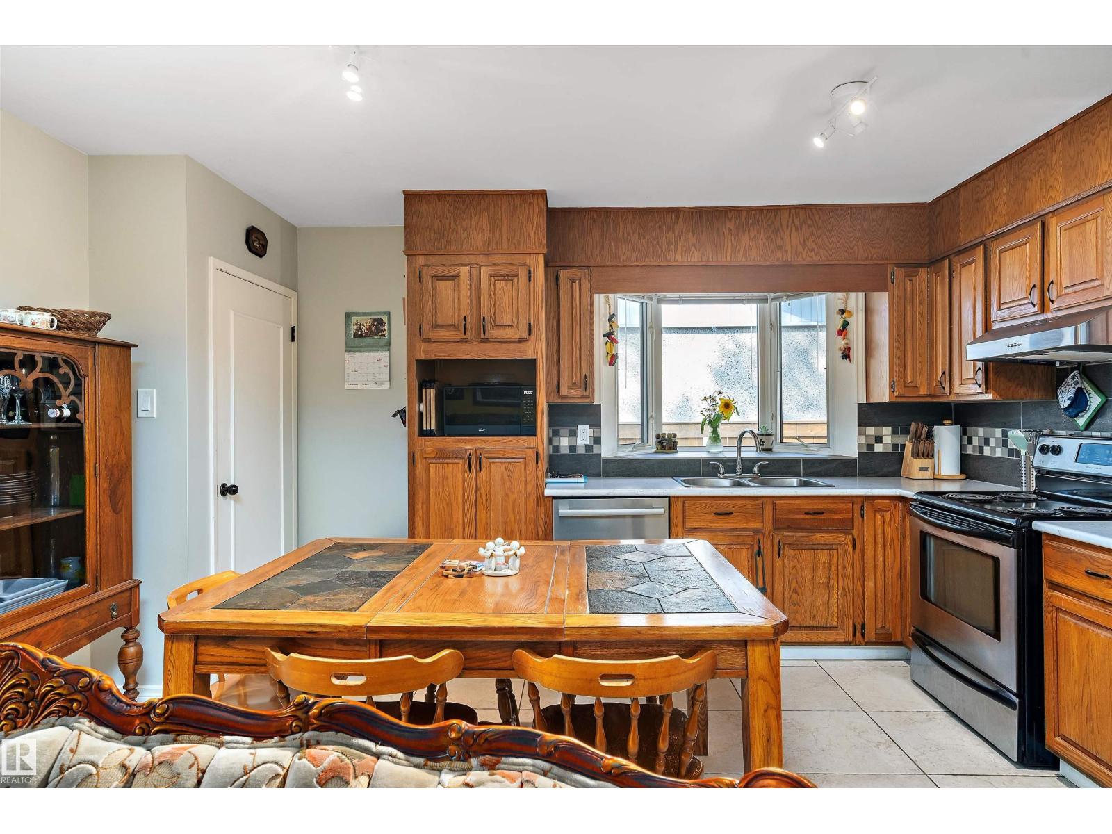 Photo 10 of 12131 52 St Nw, Edmonton AB