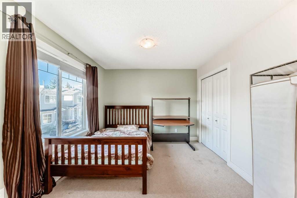 Photo 16 of 63 Bridleridge Manor Sw, Calgary AB