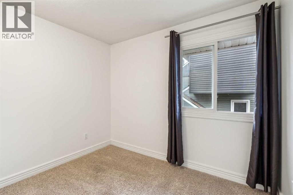 Photo 36 of 113 34 Glamis Green Sw, Calgary AB