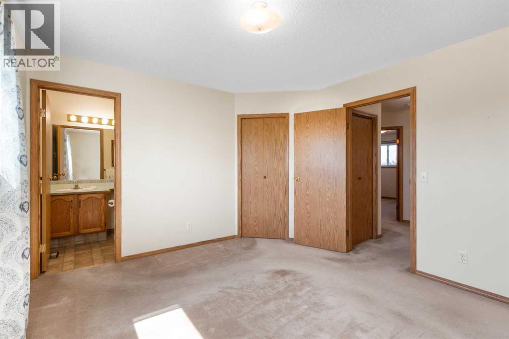 Photo 18 of 131 Tipping Close Se, Airdrie AB