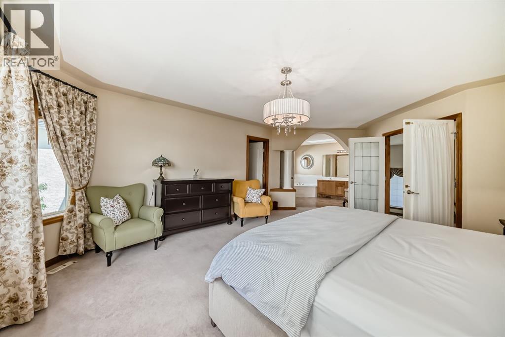 Photo 42 of 42 West Cedar Point Sw, Calgary AB