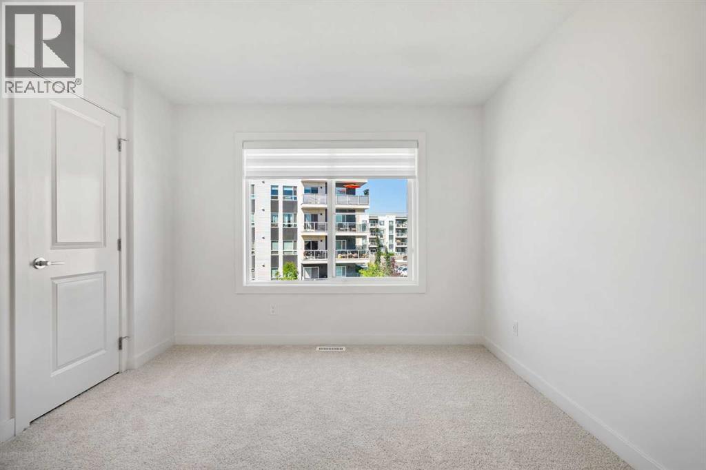 Photo 6 of 215 Seton Grove Se, Calgary AB