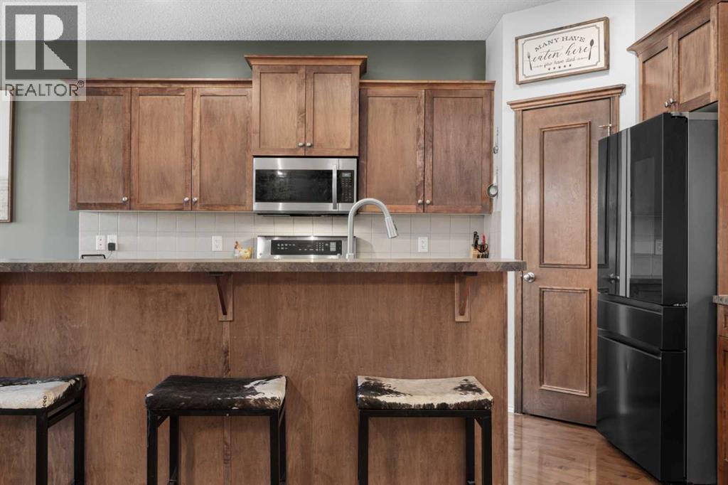 Photo 10 of 402 Cimarron Boulevard, Okotoks AB