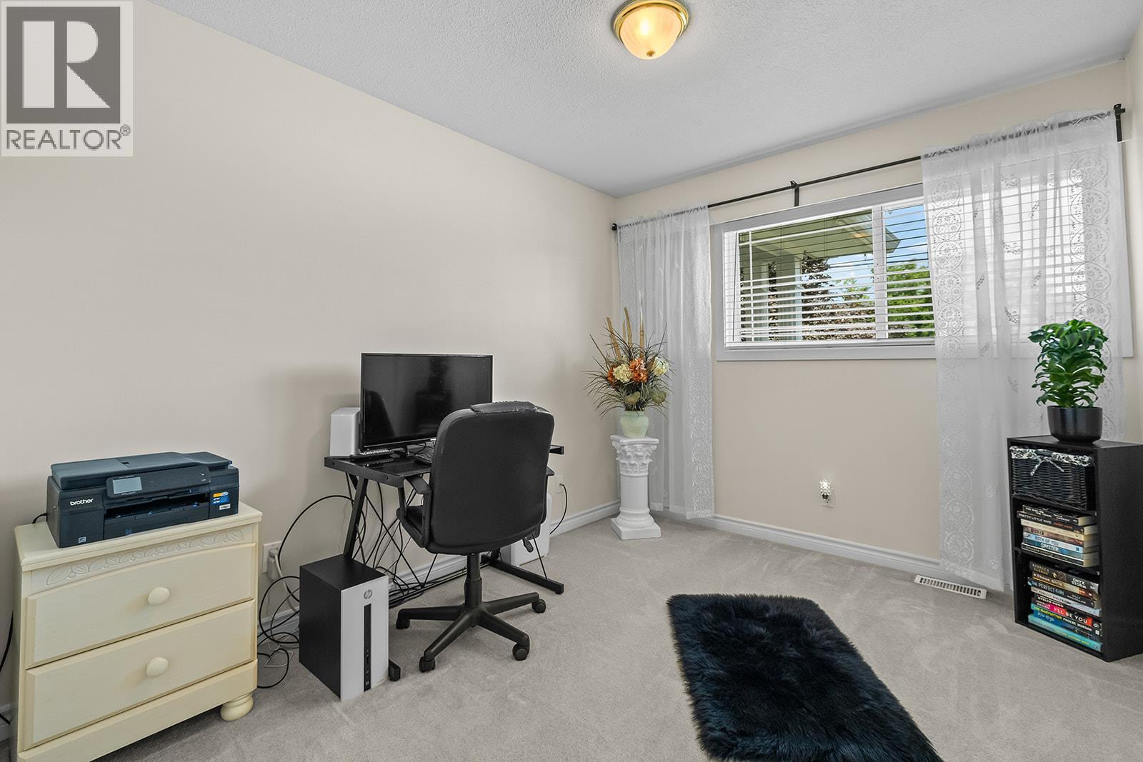 Photo 21 of 1085 Tamarack Drive, Kelowna BC