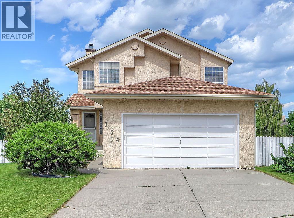 Photo 14 of 154 Sandarac Drive Nw, Calgary AB