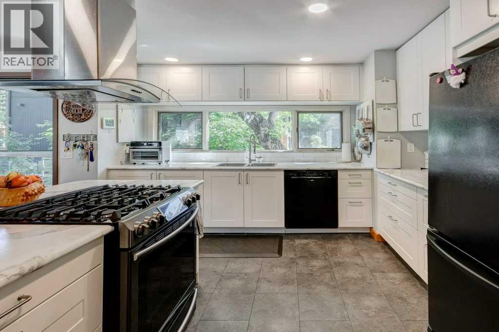 Multi-family House for Sale in  &  New Street SE Inglewood Calgary 