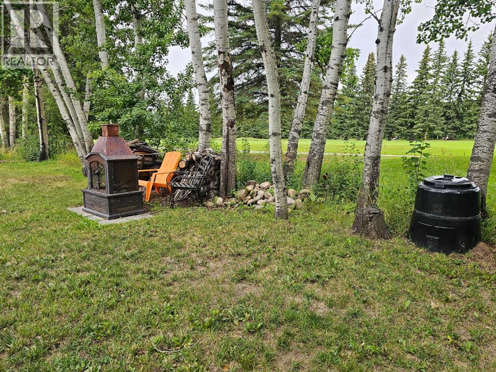 Photo 11 of 9424 Wedgewood Drive N, Wedgewood AB