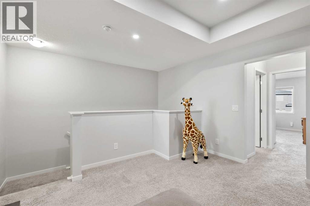 Photo 21 of 132 Wolf Hollow Crescent Se, Calgary AB