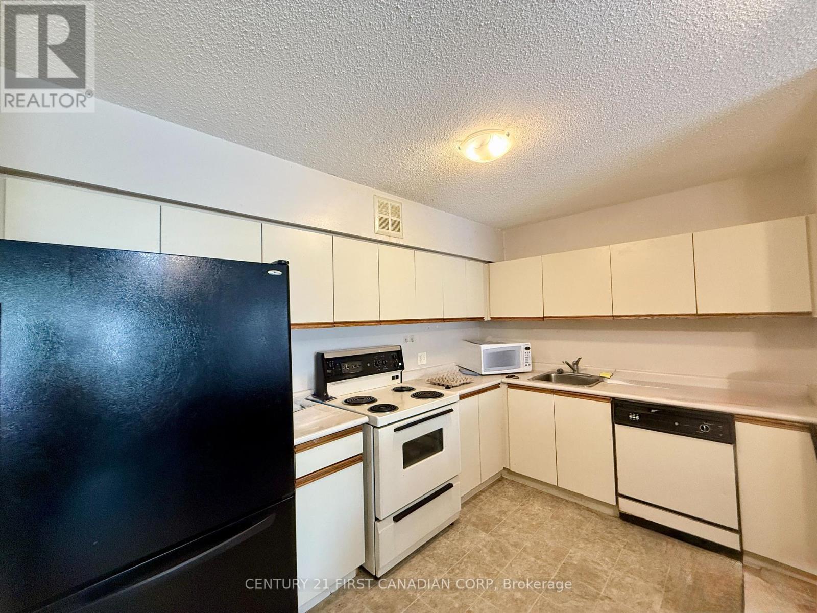 Photo 7 of 210 9 Jacksway Crescent, London North ON
