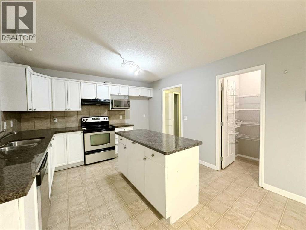 Photo 32 of 262 Luxstone Road Sw, Airdrie AB