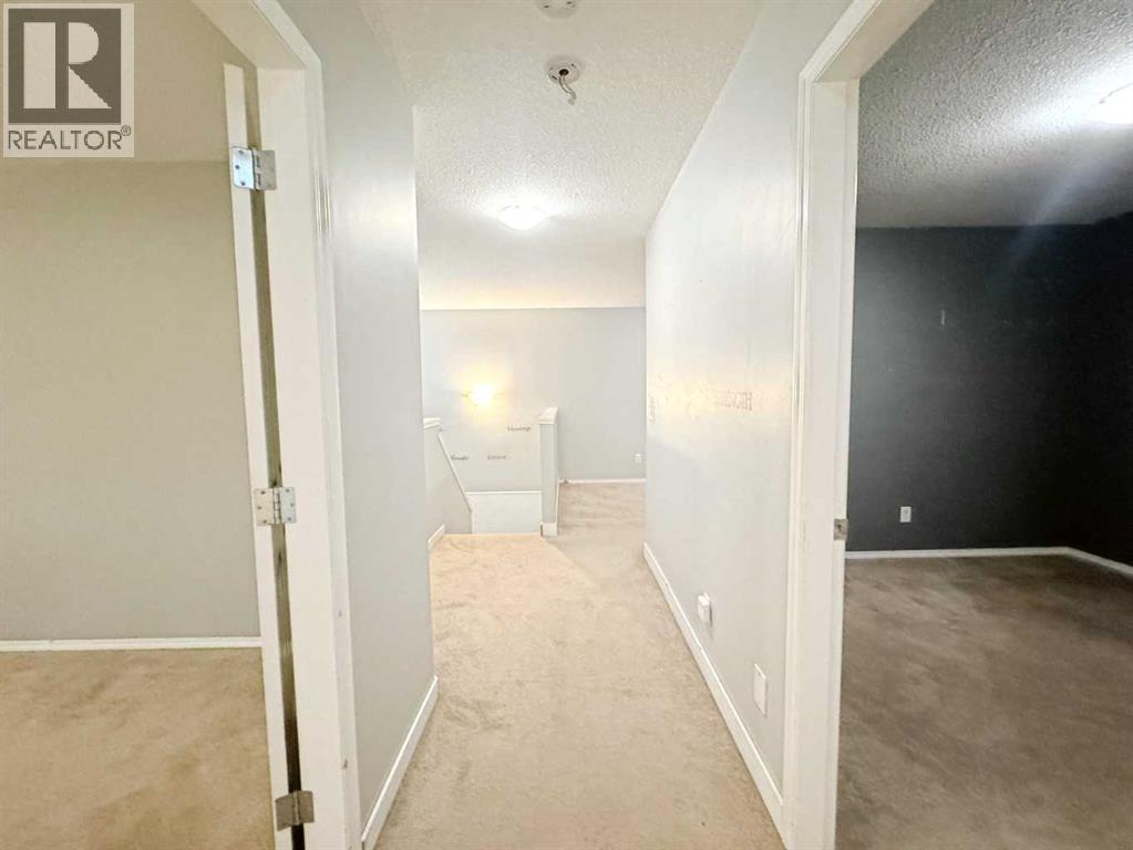 Photo 25 of 262 Luxstone Road Sw, Airdrie AB