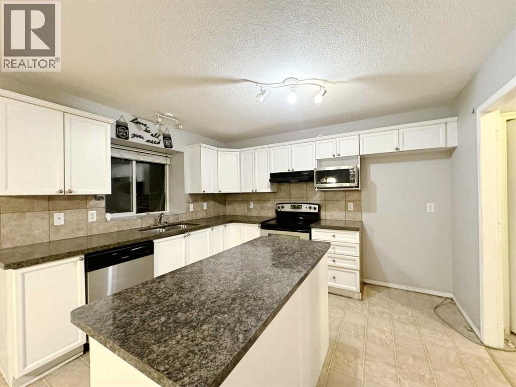 Photo 11 of 262 Luxstone Road Sw, Airdrie AB