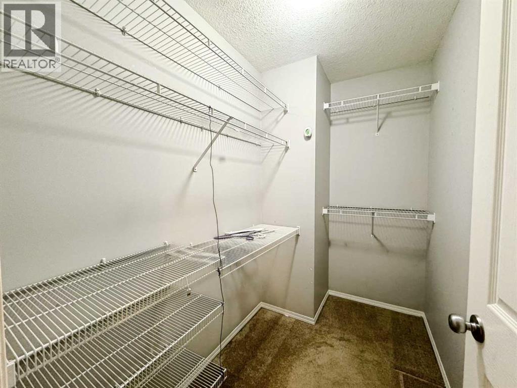 Photo 4 of 262 Luxstone Road Sw, Airdrie AB