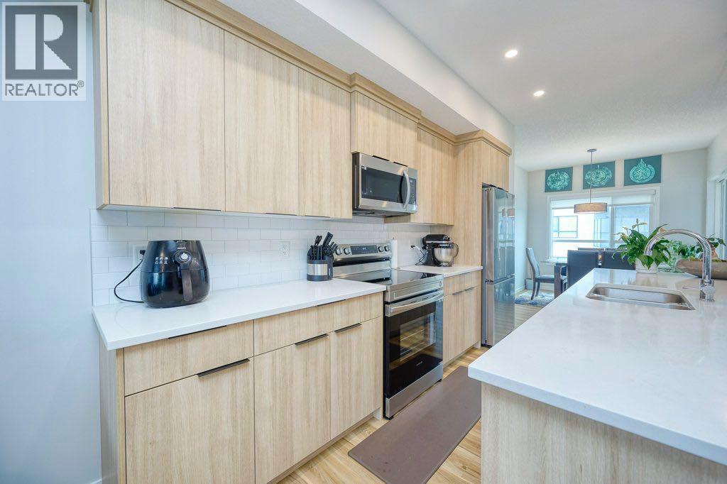 Photo 9 of 50 Cranbrook Gardens Se, Calgary AB