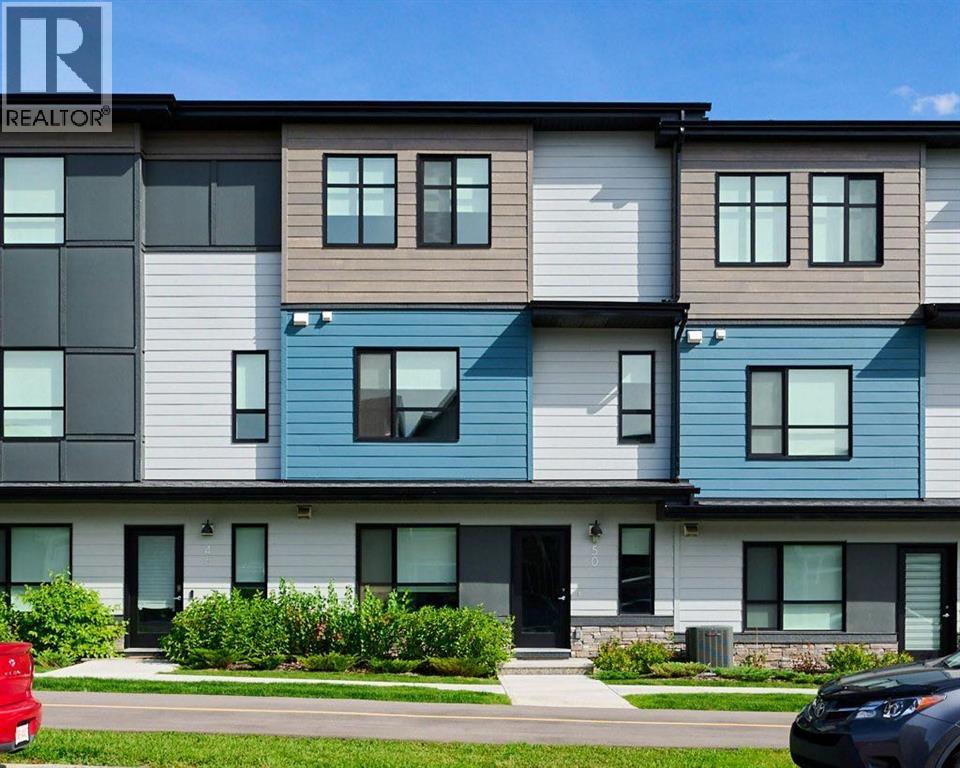 Photo 4 of 50 Cranbrook Gardens Se, Calgary AB