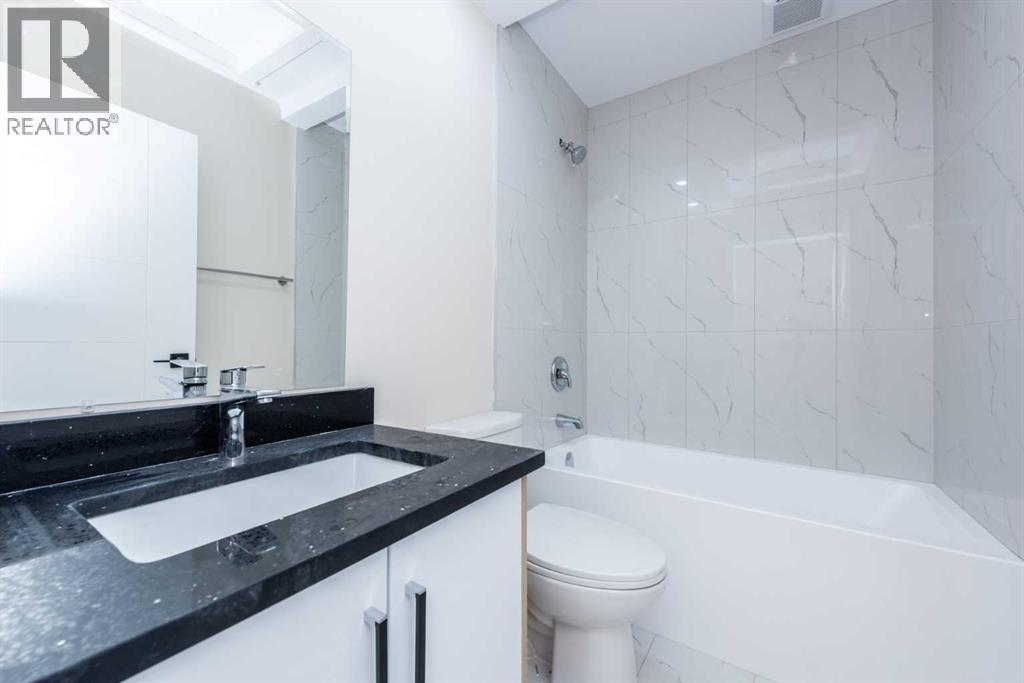 Photo 32 of 209 47 Street Se, Calgary AB