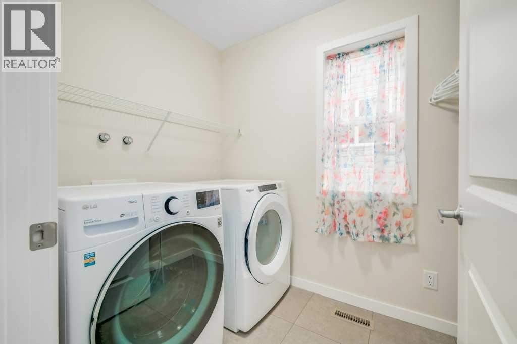 Photo 18 of 209 Buckskin Way, Cochrane AB