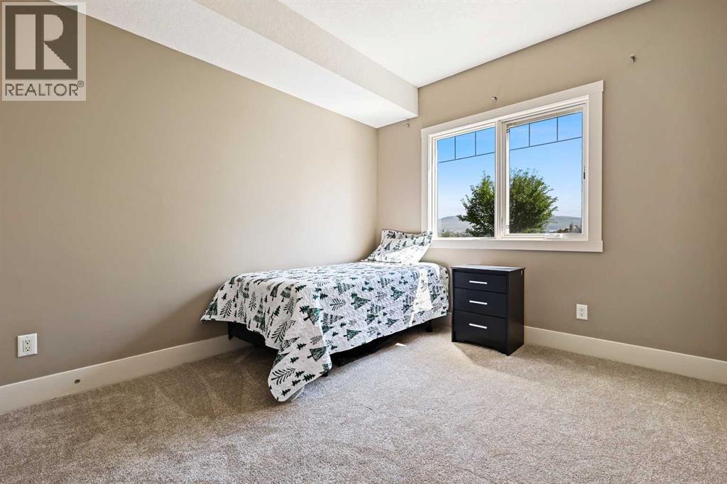 Photo 19 of 107 77 George Fox Trail, Cochrane AB