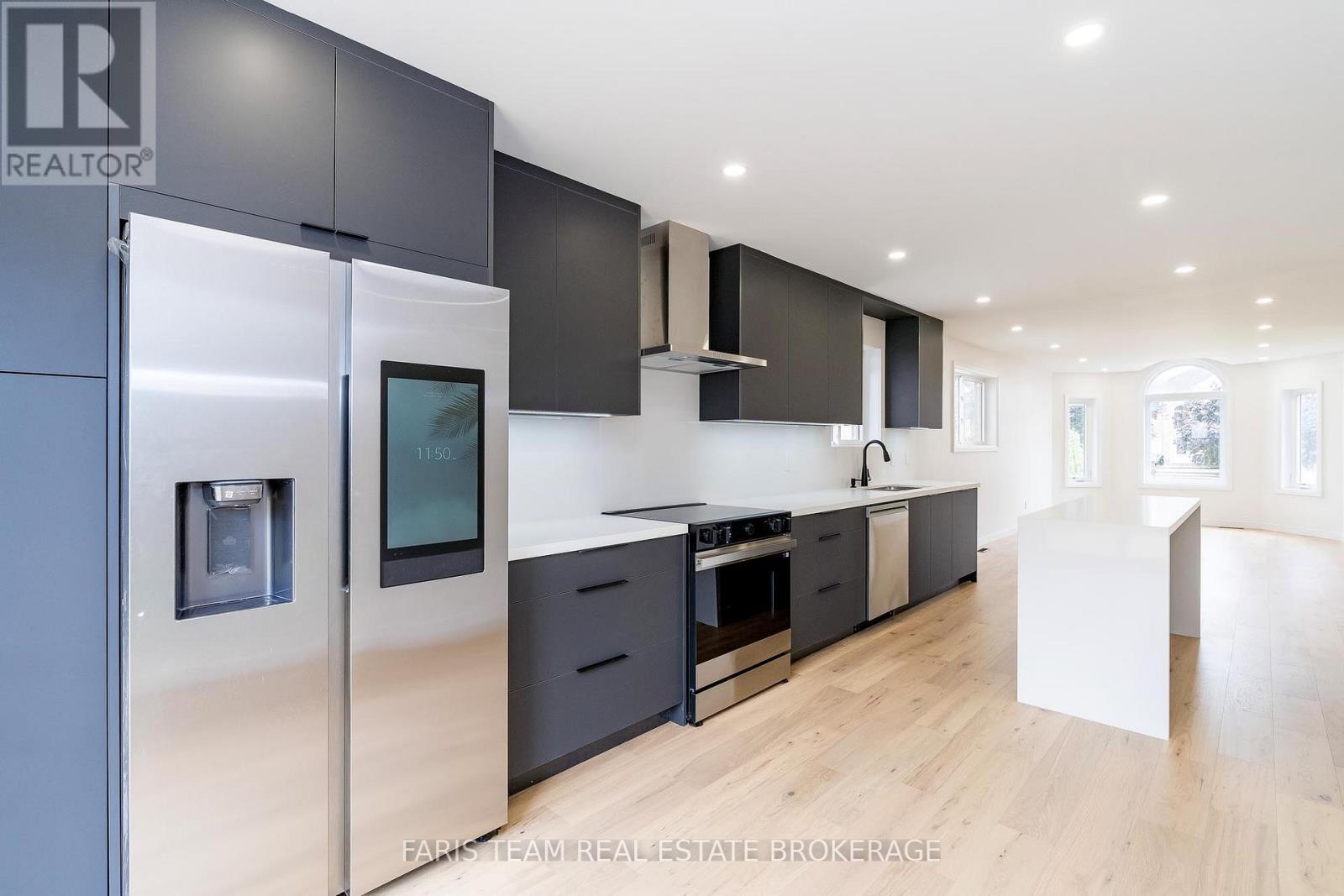 Photo 9 of 233 Wessenger Drive, Barrie ON