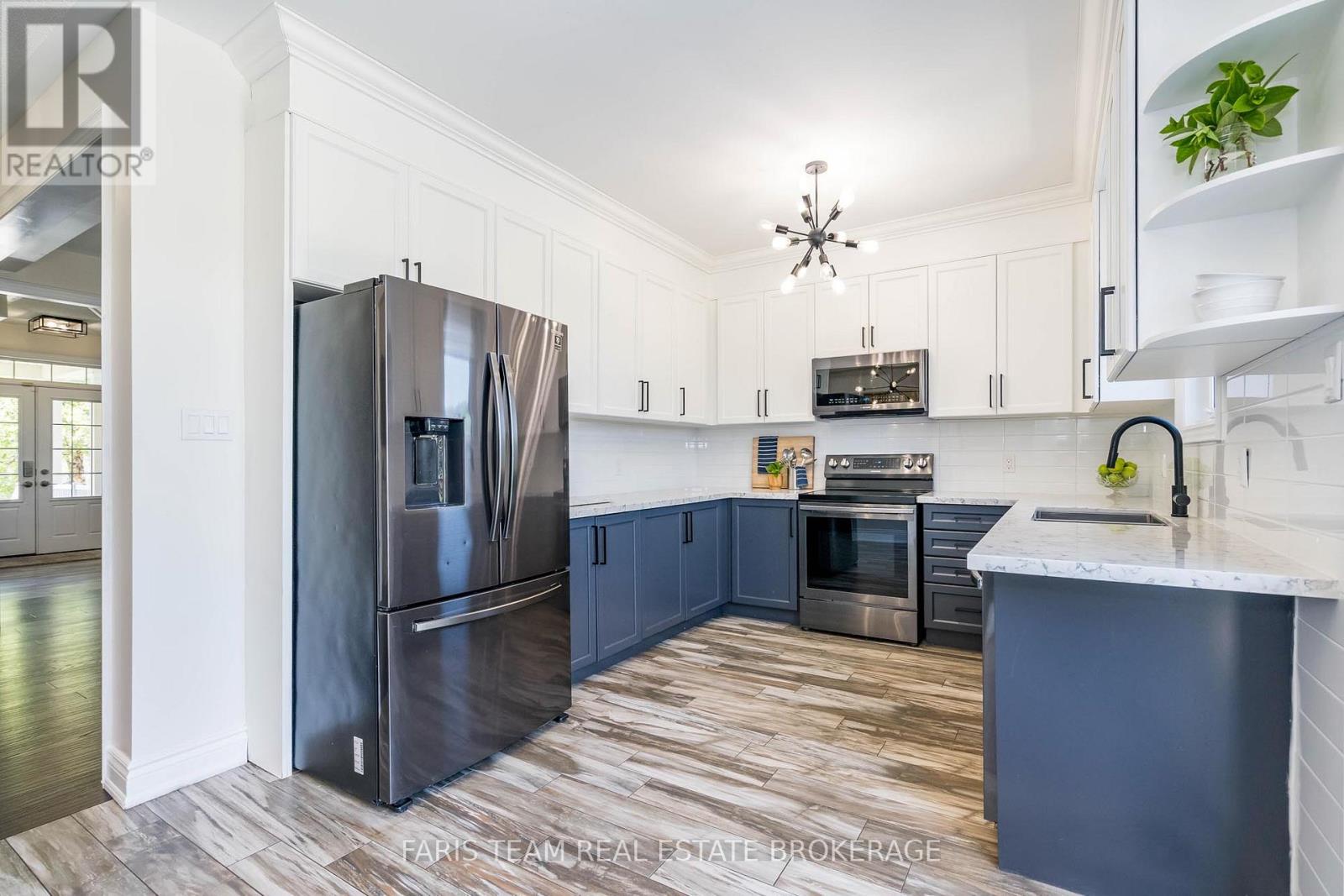 Photo 7 of 53 Christy Drive, Wasaga Beach ON