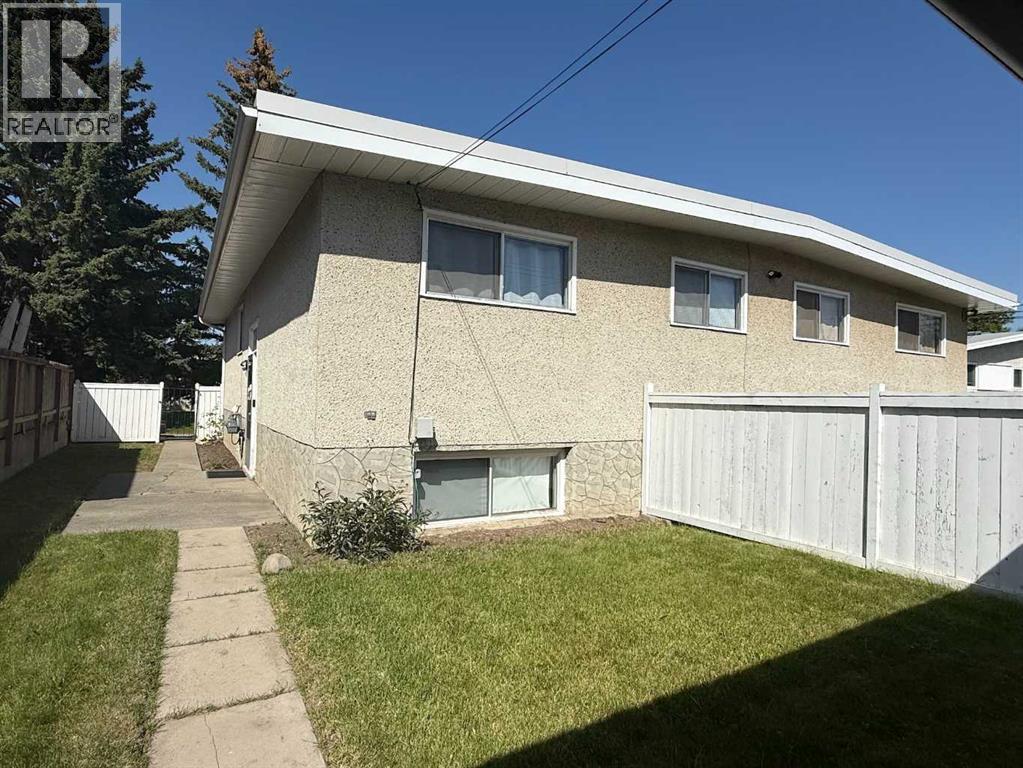 Photo 10 of 7331 7329 Huntertown Crescent Nw, Calgary AB