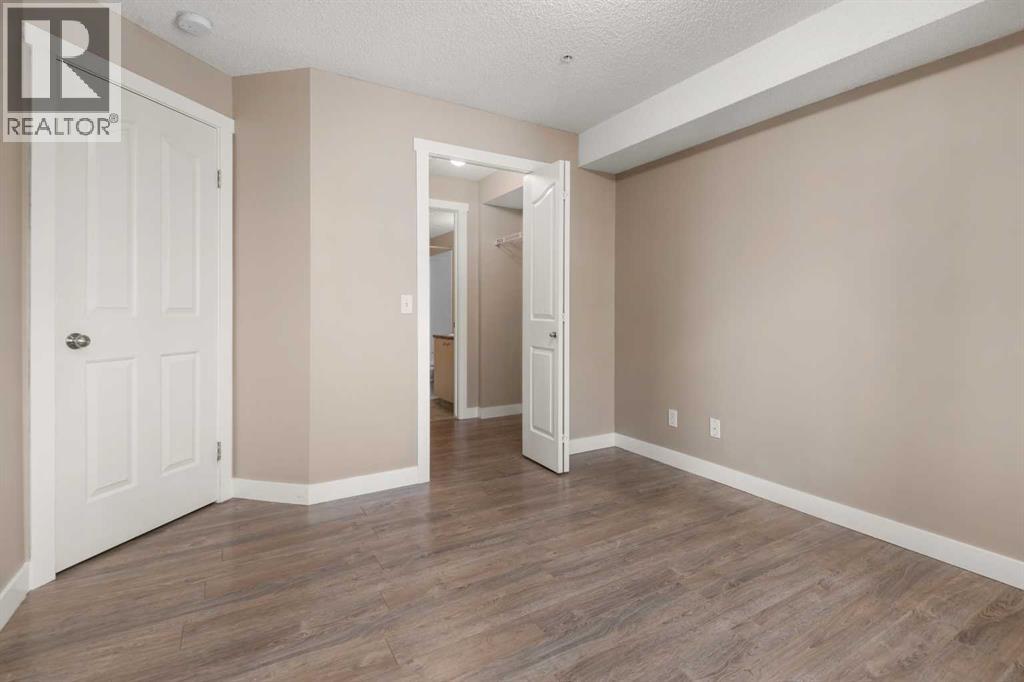 Photo 13 of 8225 304 Mackenzie Way Sw, Airdrie AB