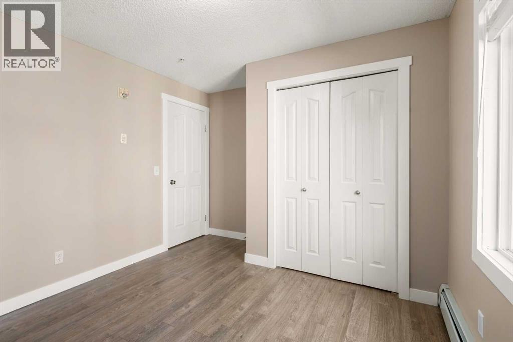 Photo 3 of 8225 304 Mackenzie Way Sw, Airdrie AB