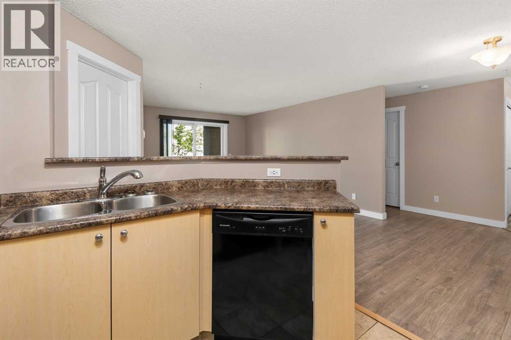 Photo 11 of 8225 304 Mackenzie Way Sw, Airdrie AB
