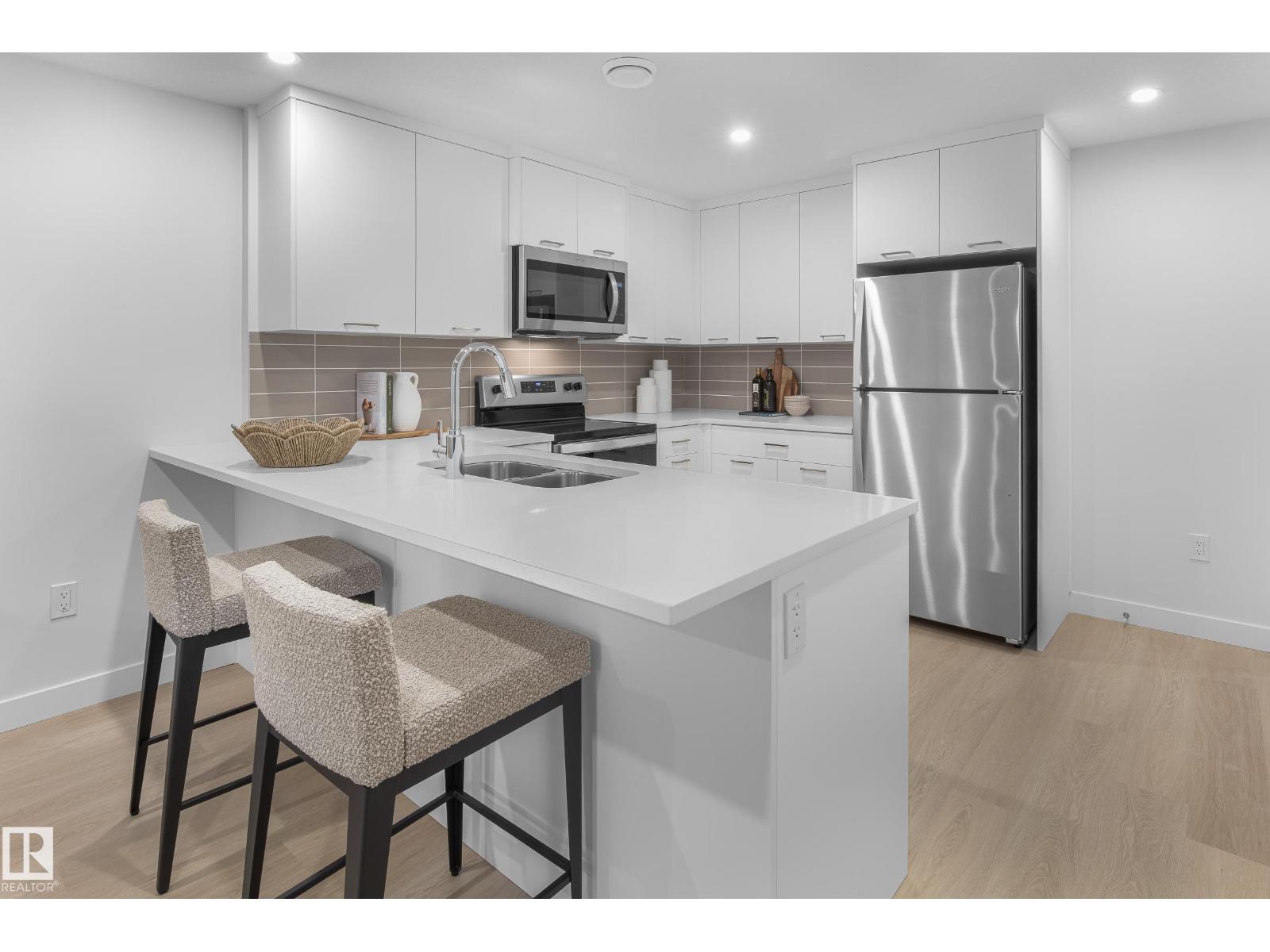 Photo 6 of 2222 Muckleplum Cr Sw, Edmonton AB