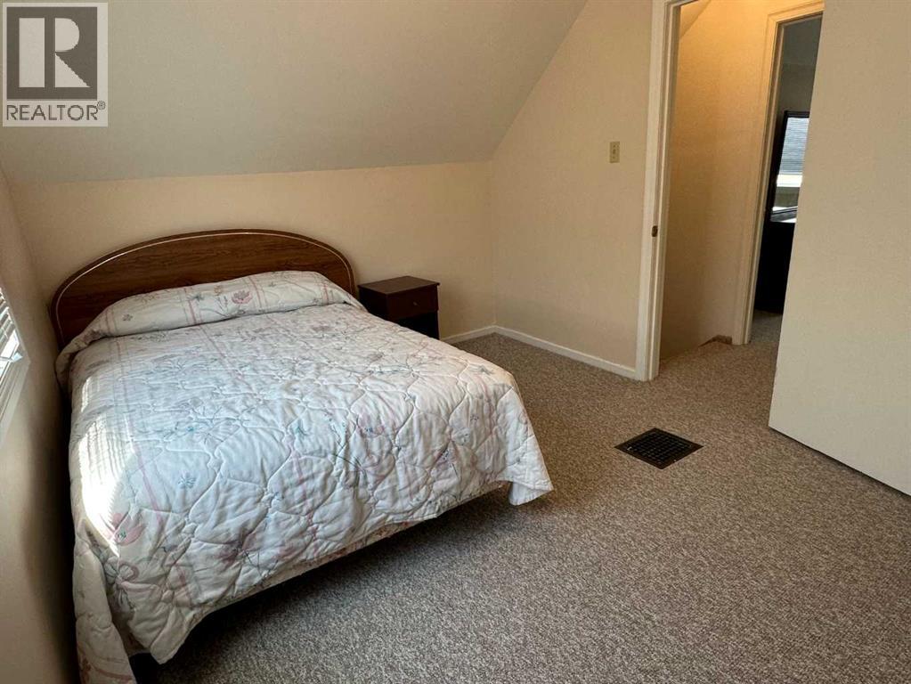 Photo 1 of 5402 57 Street, Taber AB