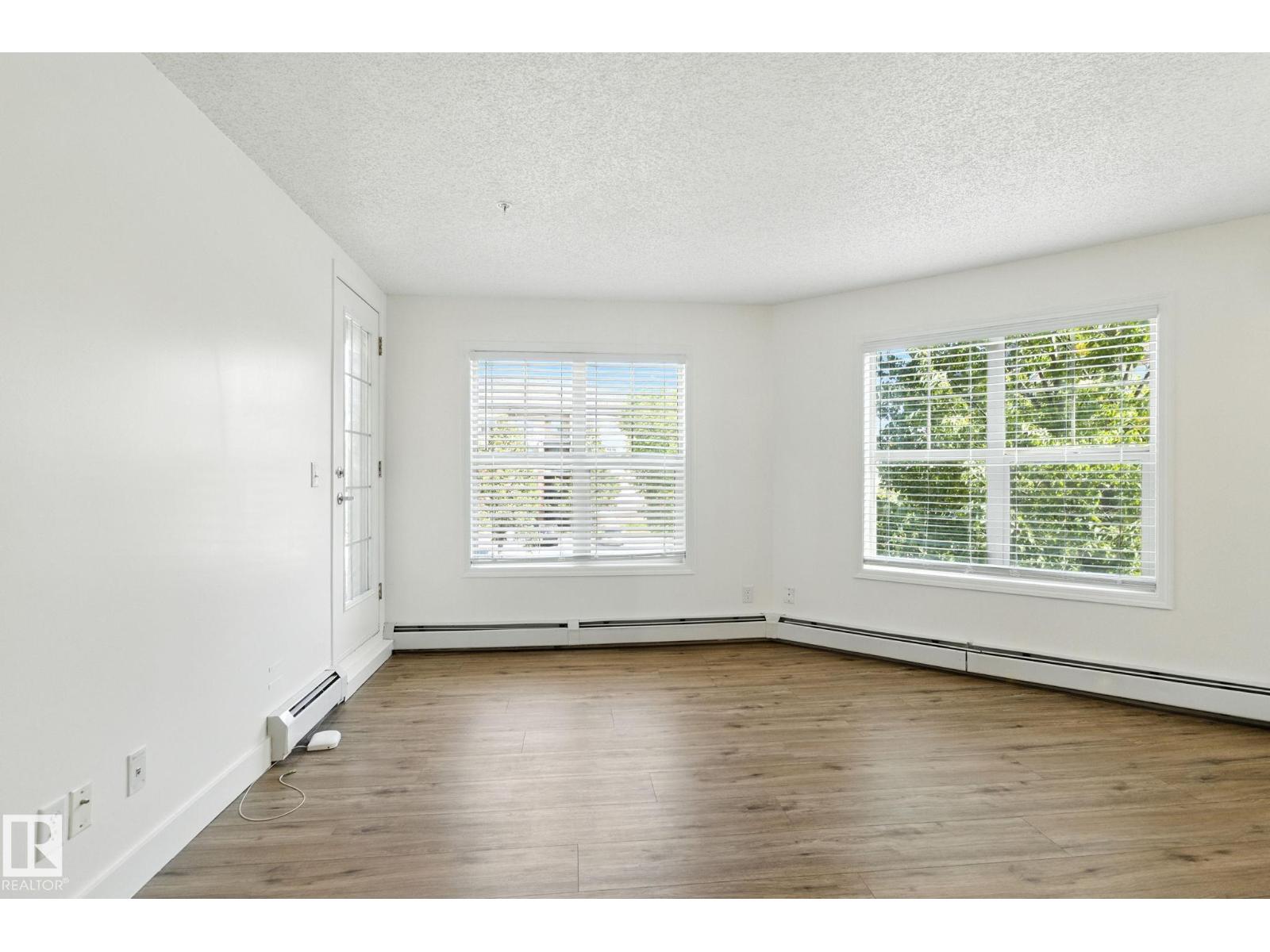 Photo 11 of 213 11449 Ellerslie Rd Sw, Edmonton AB