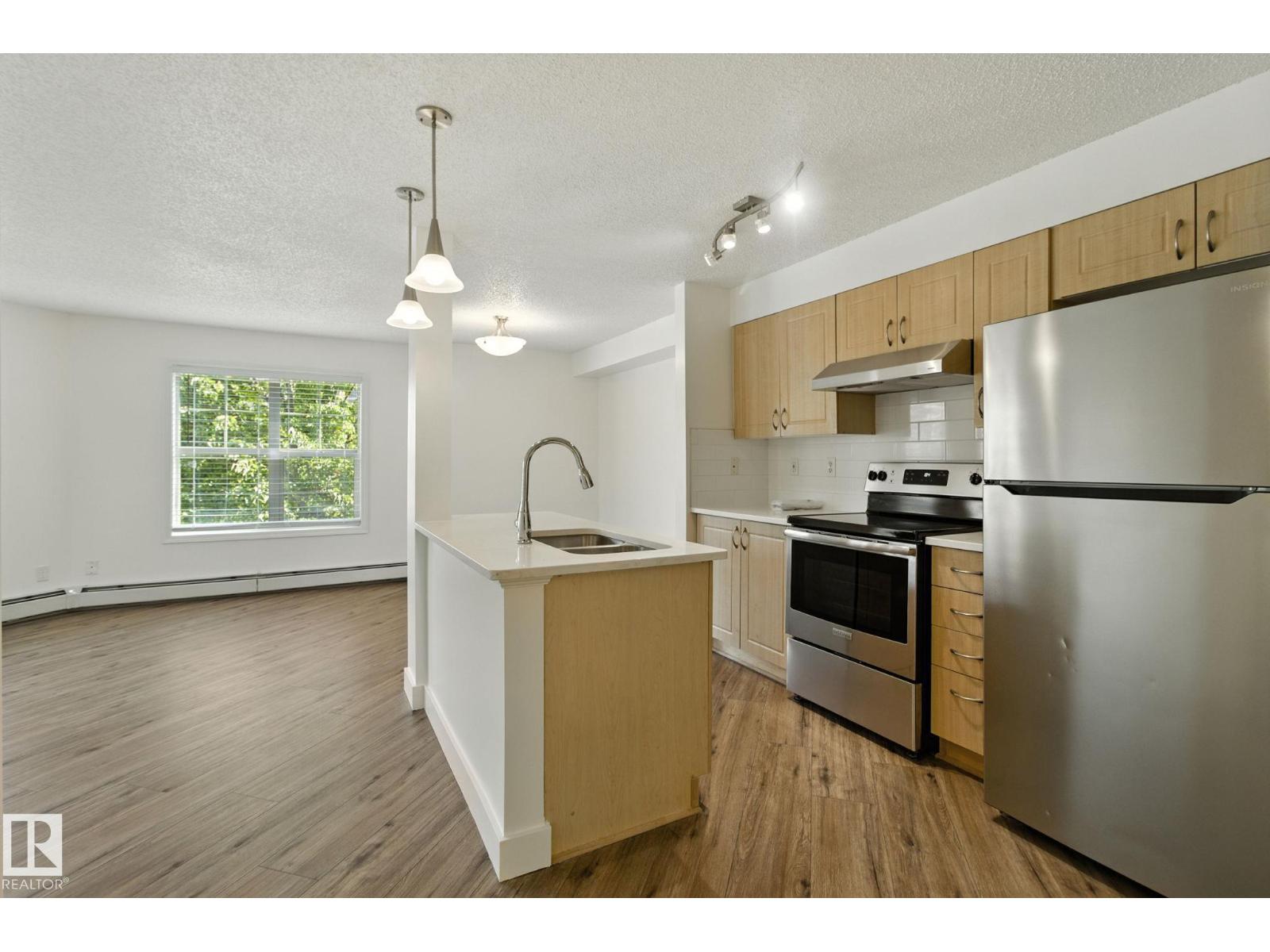 Photo 10 of 213 11449 Ellerslie Rd Sw, Edmonton AB