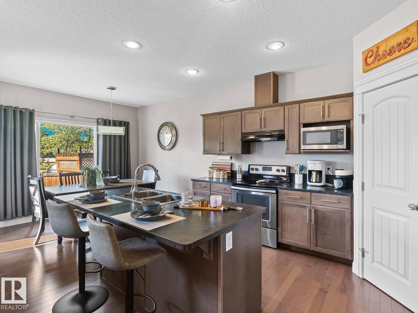 Photo 4 of 57 Meadowland Cr, Spruce Grove AB