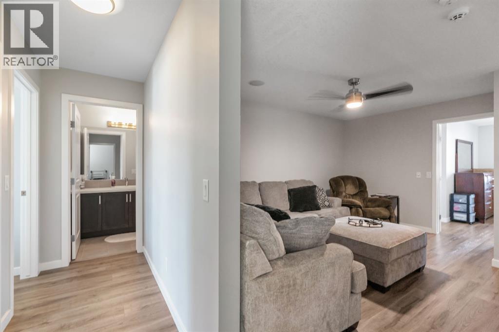 Photo 33 of 128 Midtown Court Sw, Airdrie AB