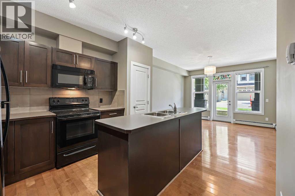 Photo 5 of 102 48 Panatella Road Nw, Calgary AB
