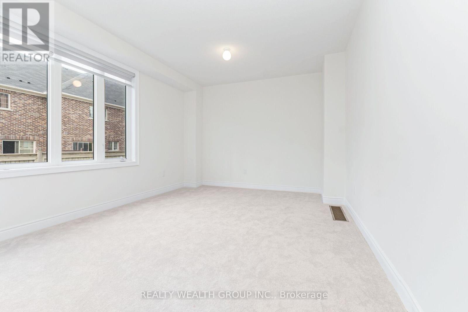 Photo 8 of 221 Tennant Circle, Vaughan ON