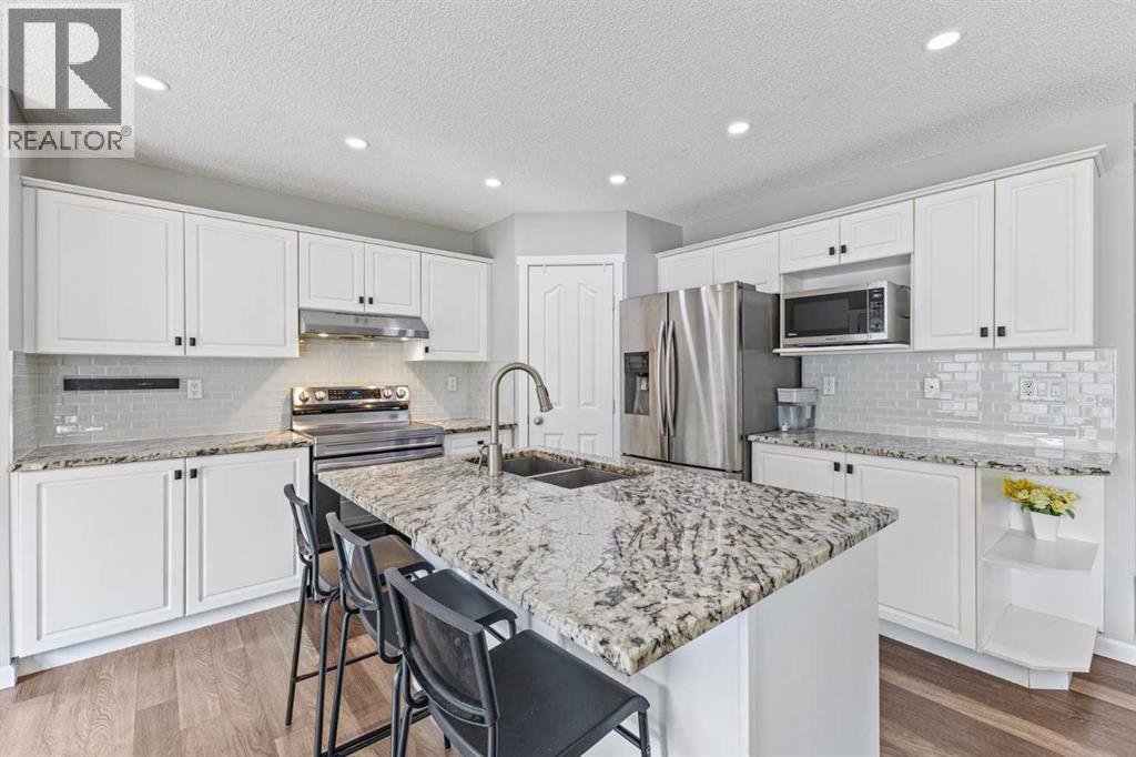 Photo 10 of 30 Spring Mews Sw, Calgary AB