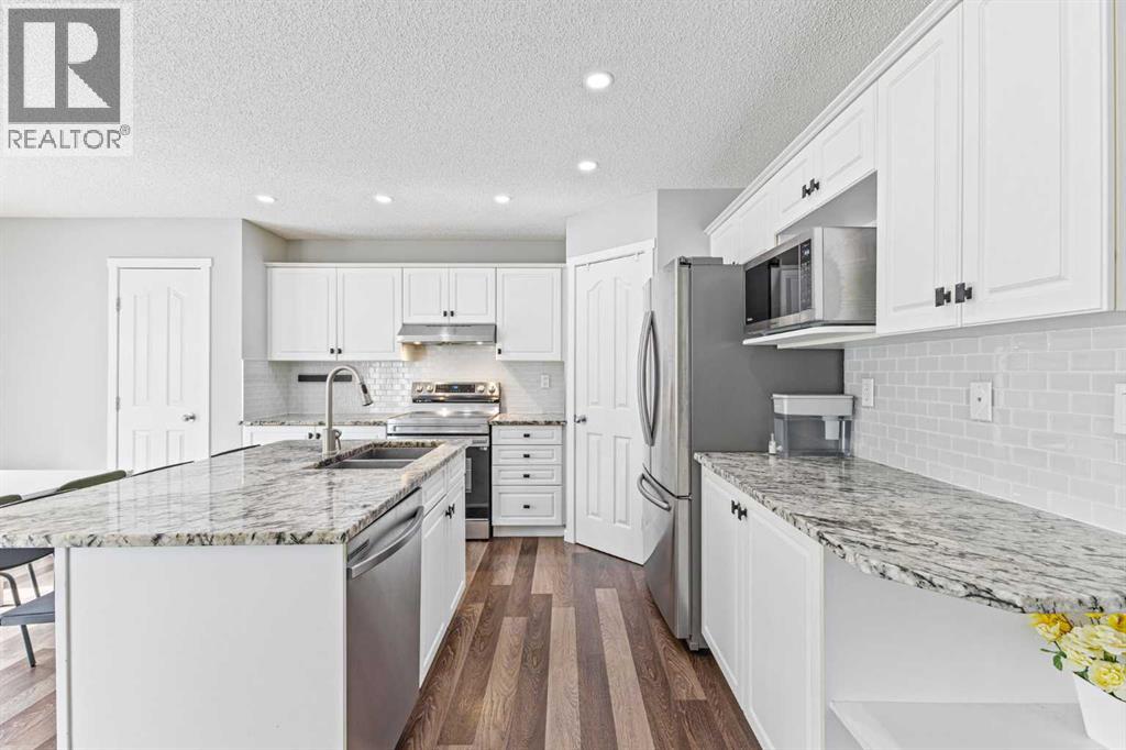 Photo 11 of 30 Spring Mews Sw, Calgary AB