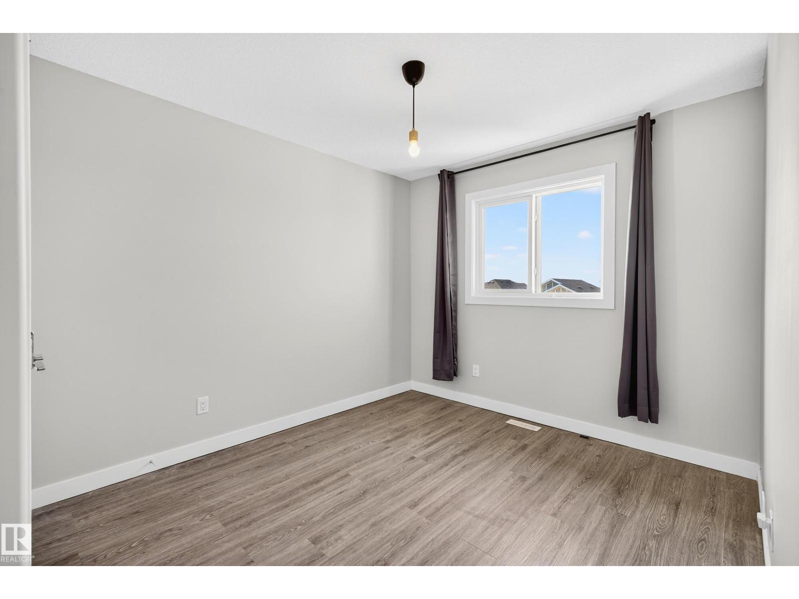 Photo 20 of 4710 35 St, Beaumont AB