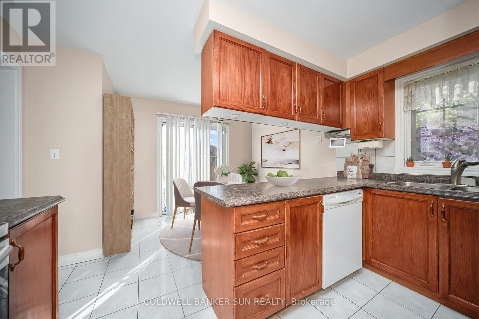 Photo 11 of 138 Pressed Brick Drive, Brampton ON