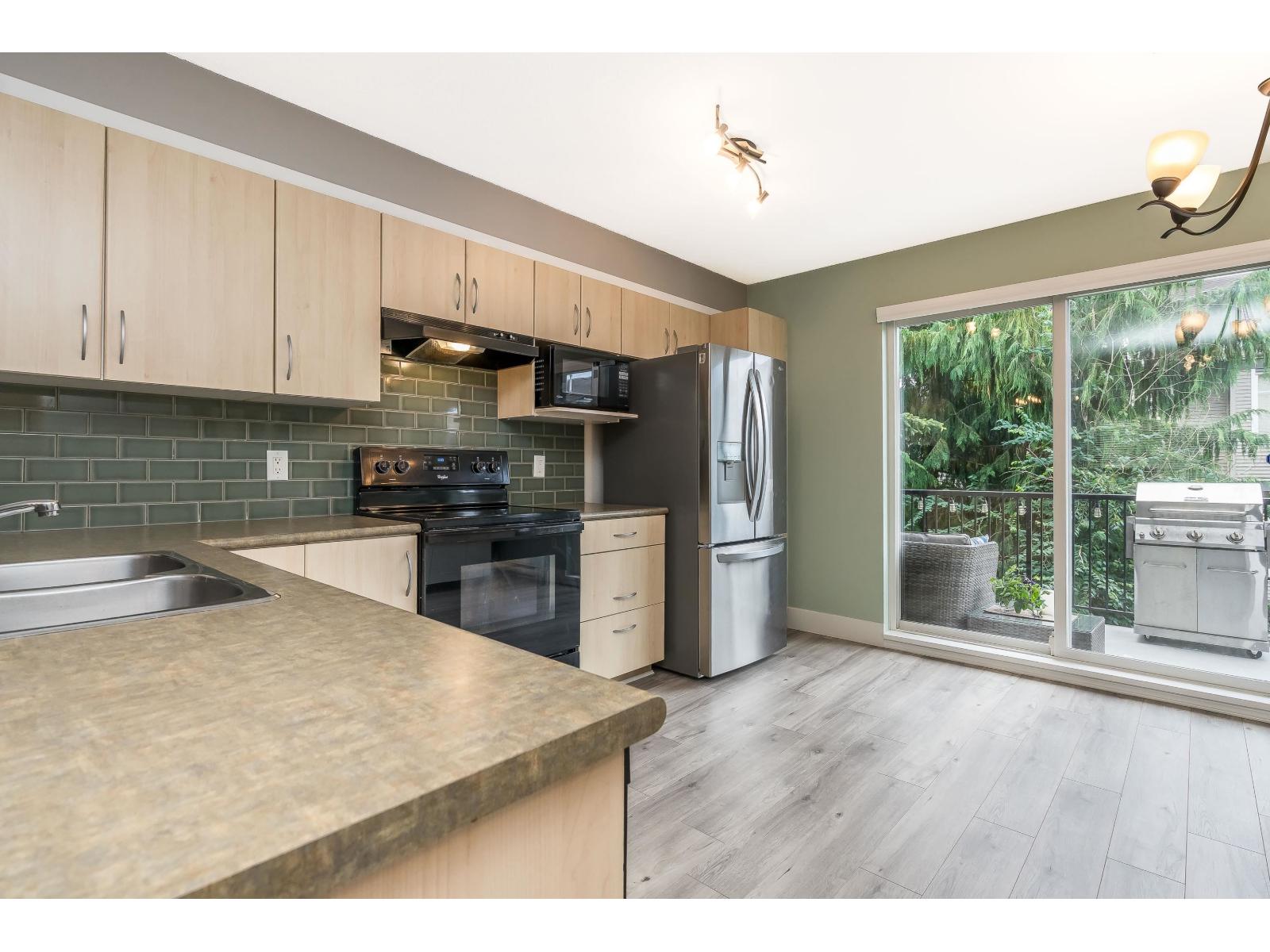 Photo 4 of 1 6747 203 Street, Langley BC