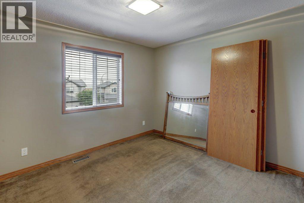 Photo 27 of 2617 Coopers Circle Sw, Airdrie AB