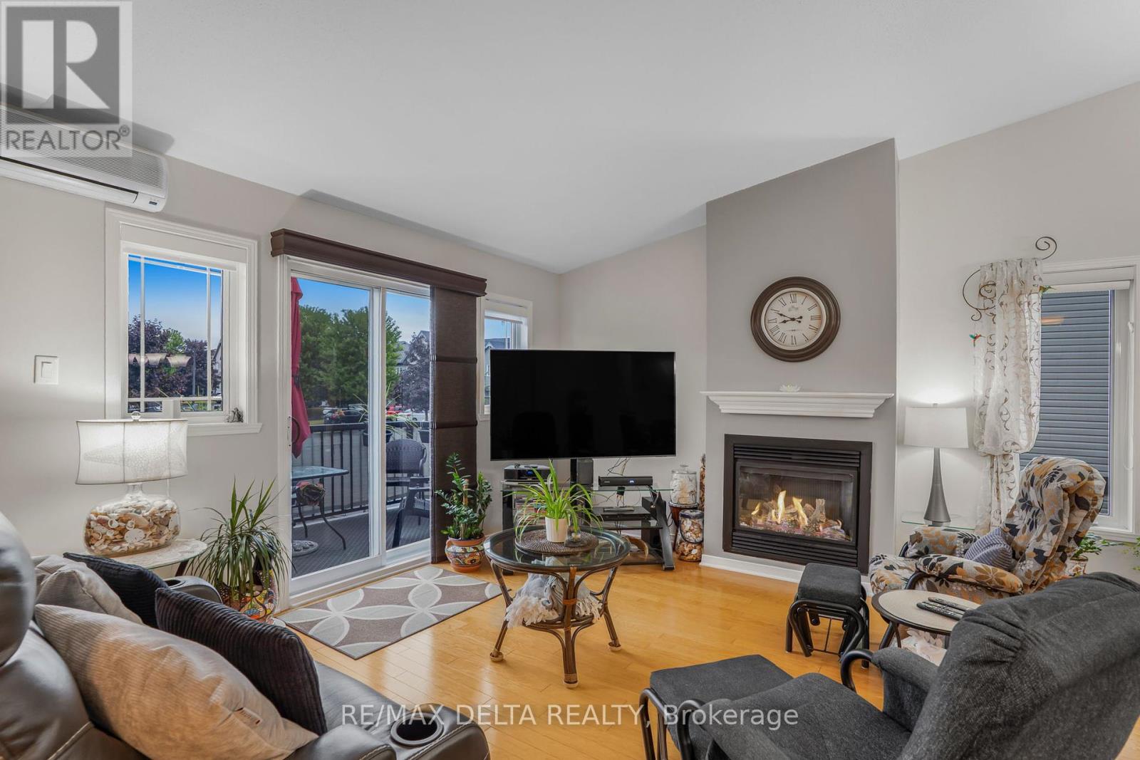 Living room with gas fireplace.