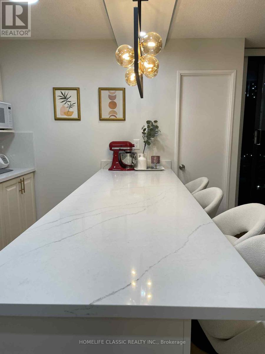 Photo 8 of 603 90 Ling Road, Toronto ON