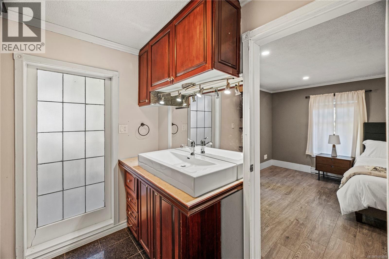 Photo 23 of 2206 Millstream Rd, Langford BC