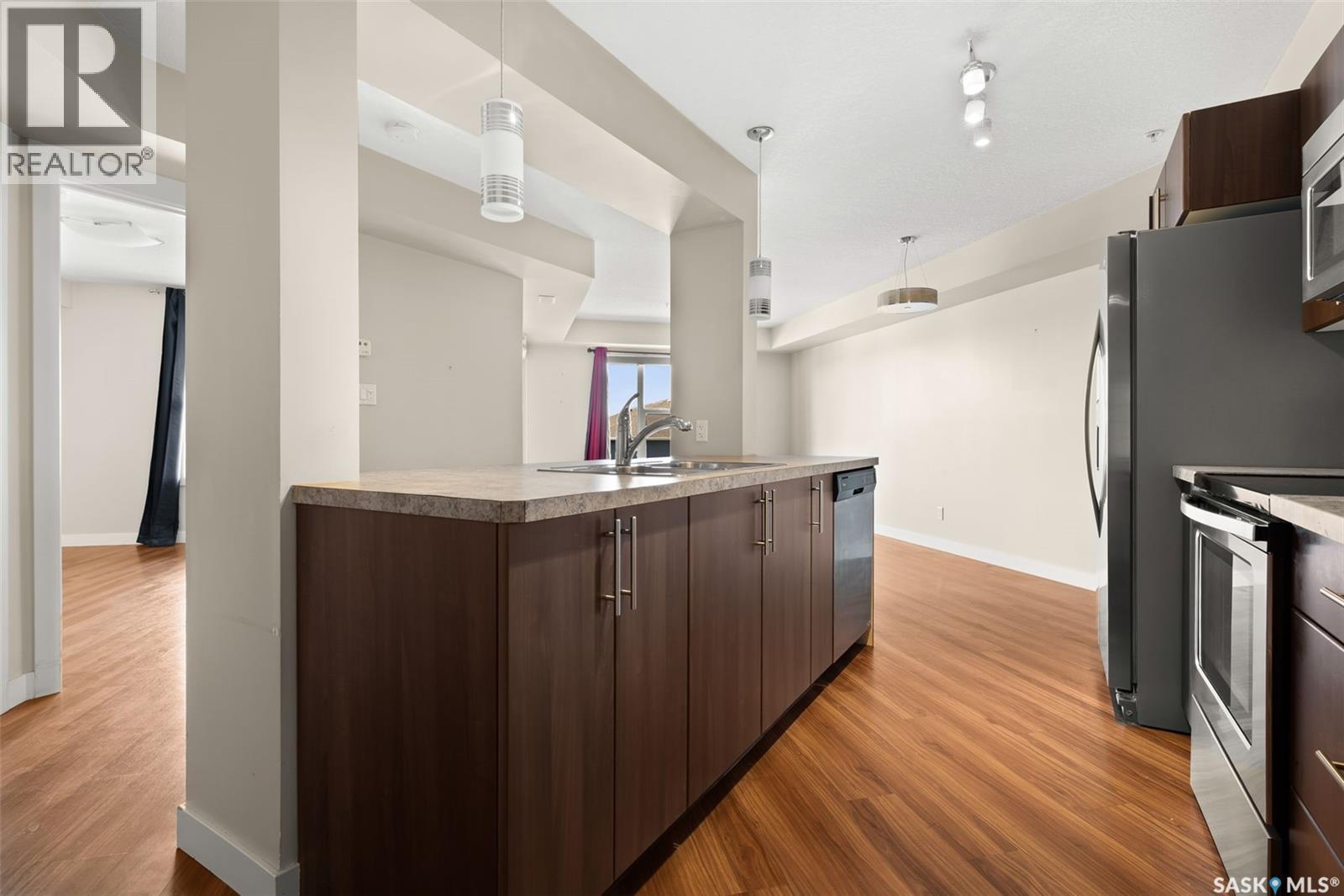 Photo 8 of 411 5301 Universal Crescent, Regina SK