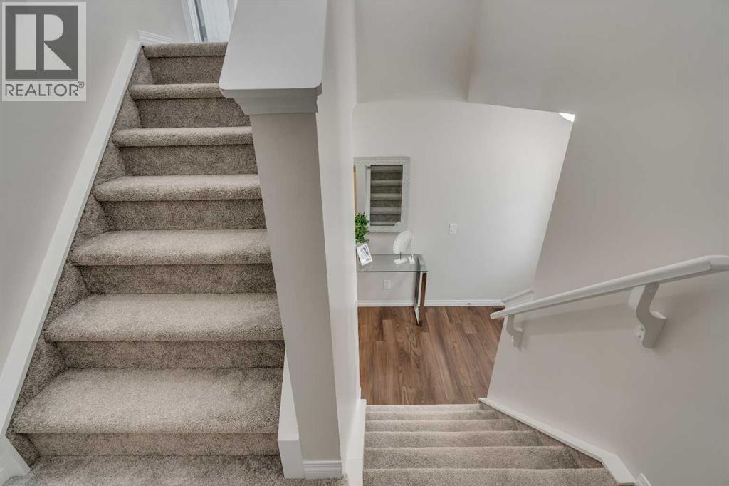 Photo 23 of 147 Osborne Rise Sw, Airdrie AB